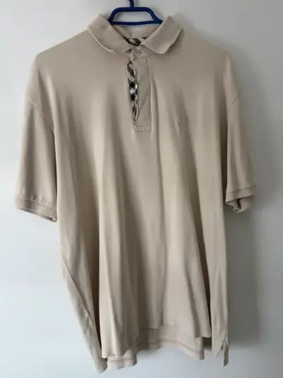 Polo beige con detalle a cuadros - miniatura 1
