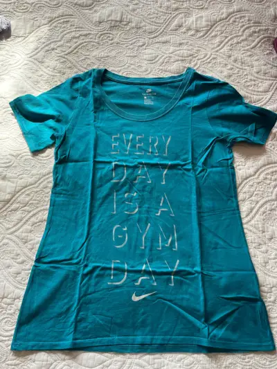 Polera deportiva Nike turquesa - miniatura 1
