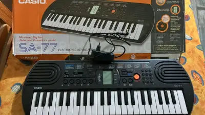 Teclado electrónico Casio SA-77 - miniatura 1