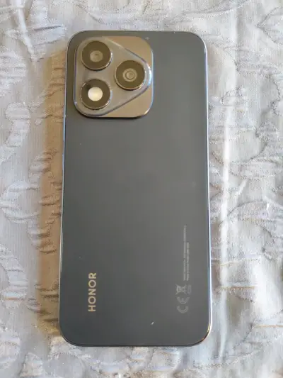 Smartphone con cargador y funda - miniatura 3