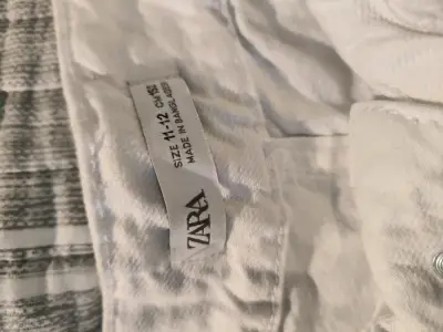 Pantalones anchos blancos desgastados - miniatura 2
