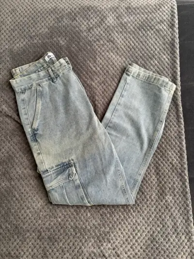 Jeans azul claro desgastados - miniatura 1