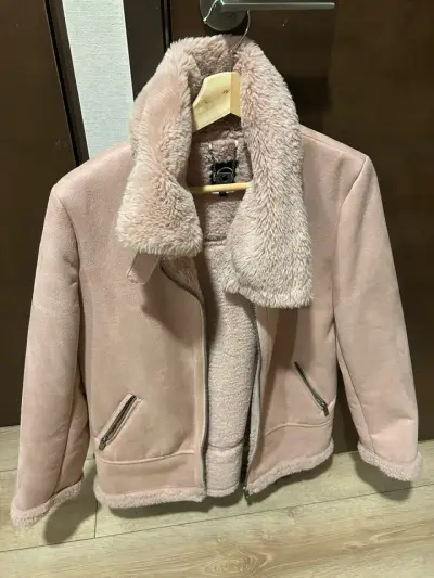 Chaqueta  rosada muy poco usado - miniatura 1