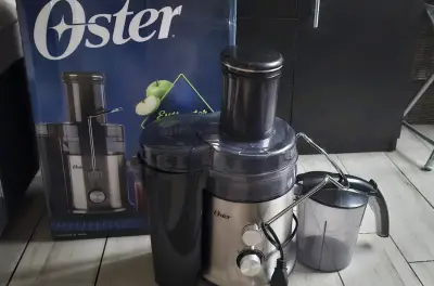 Extractor de jugos Oster nuevo - miniatura 1