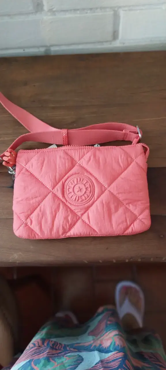 Cartera rosa acolchada