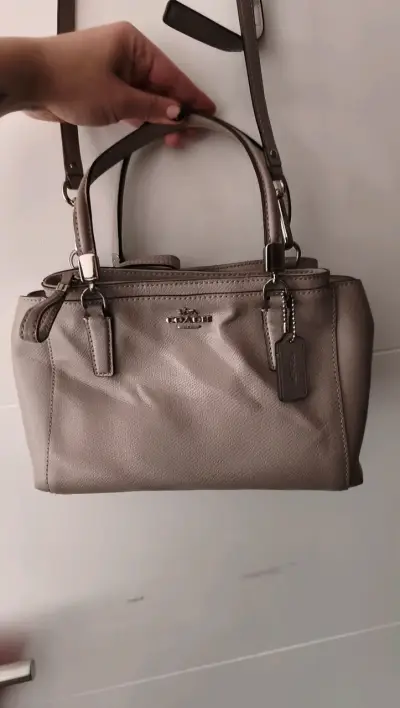 Cartera Coach color beige - miniatura 1