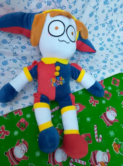 Muñeco de peluche colorido - miniatura 1