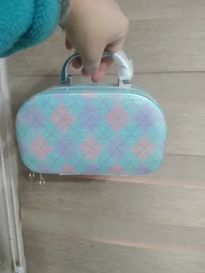 Neceser con diseño de rombos - miniatura 1