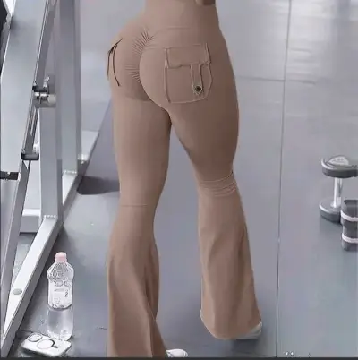 Pantalones acampanados color beige - miniatura 1