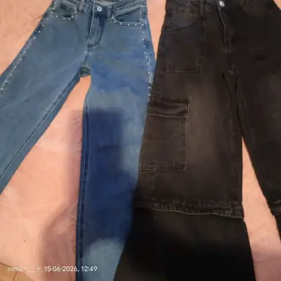 Pantalones de mezclilla azul y negro - miniatura 1
