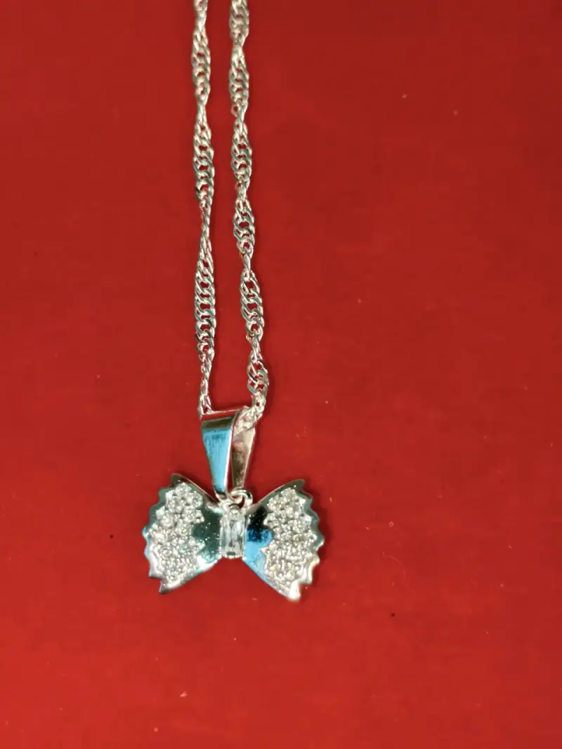 Collar con dije de moño plateado, plata 925, nacio - 1