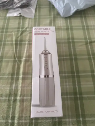 Irrigador oral portátil - miniatura 1