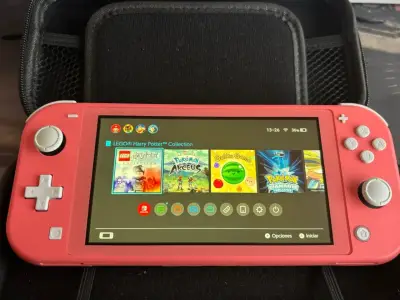 Nintendo Switch Lite coral - miniatura 1