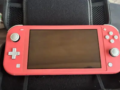 Nintendo Switch Lite coral - miniatura 3