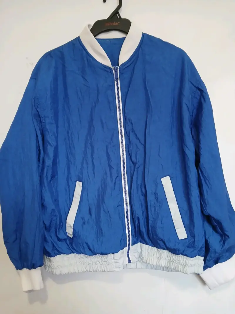 Chaqueta azul cortavientos - 1