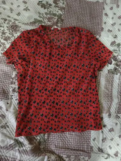 Polera naranja con estampado floral - miniatura 1