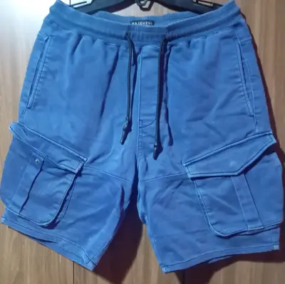 Short azul con bolsillos - miniatura 1