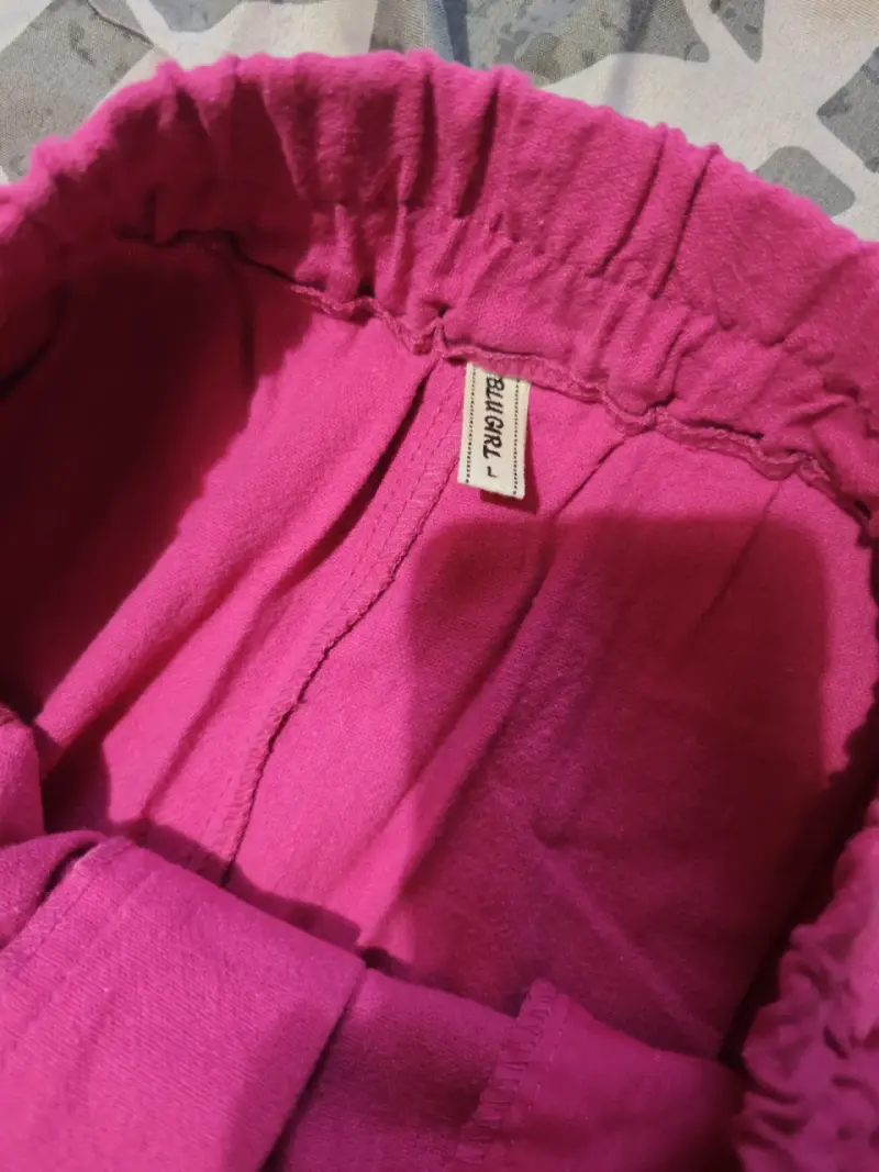Pantalones rosados de tela - 2