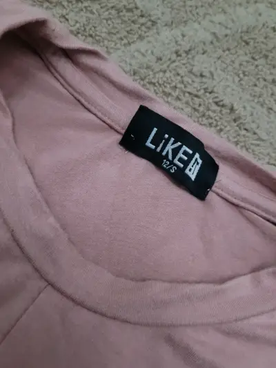 Polera rosa con nudo frontal - miniatura 2