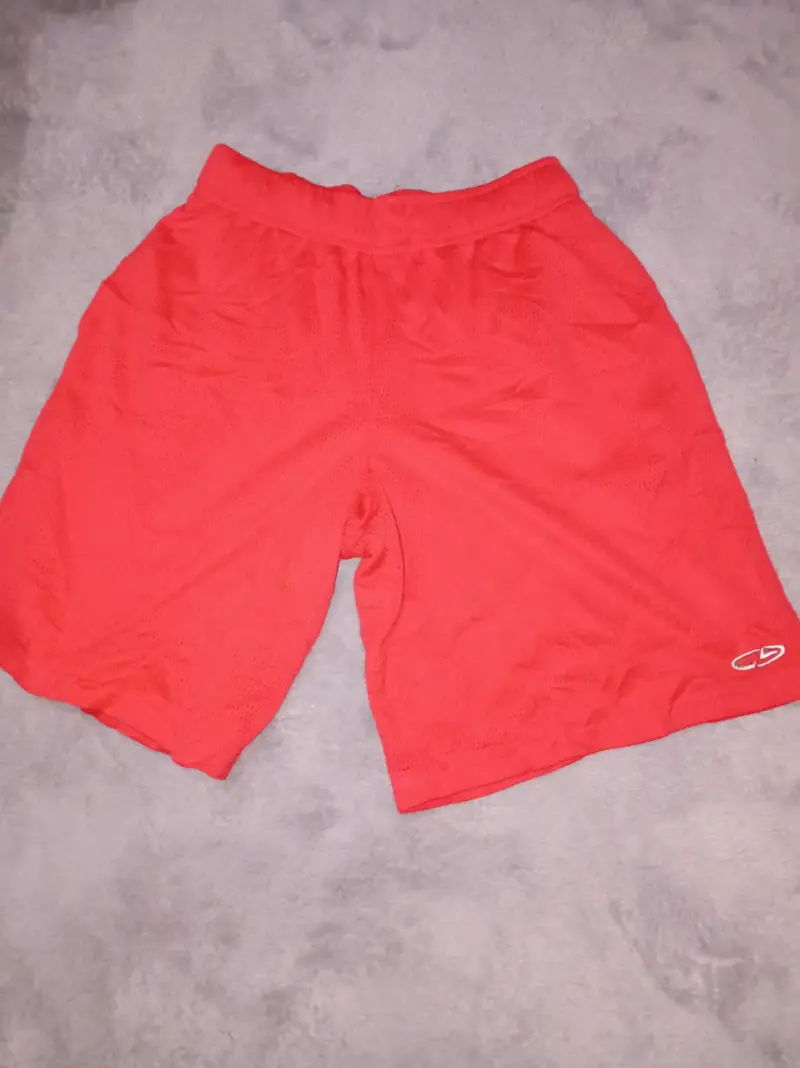 Shorts deportivos naranja marca Champion