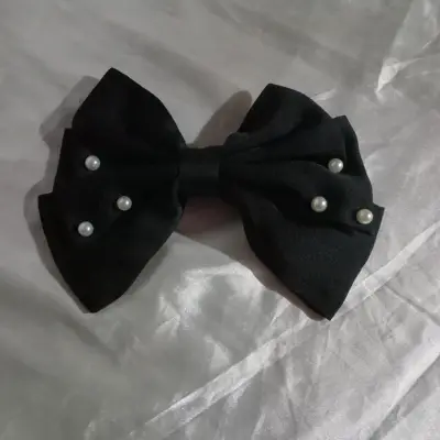 Moño negro con perlas decorativas - miniatura 1