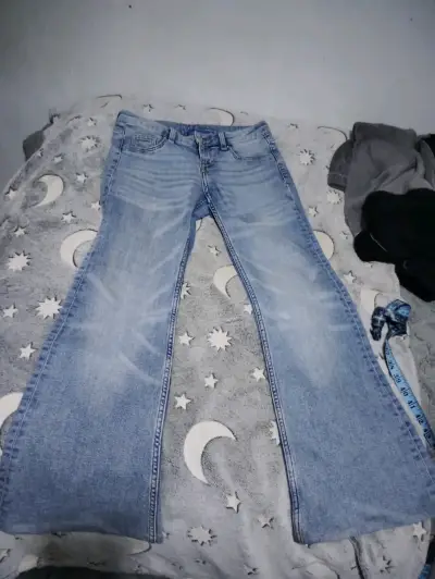 Jeans celestes de mezclilla - miniatura 1