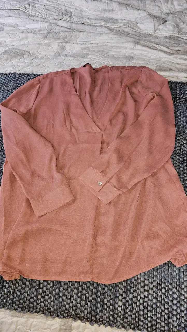 Blusa rosa elegante