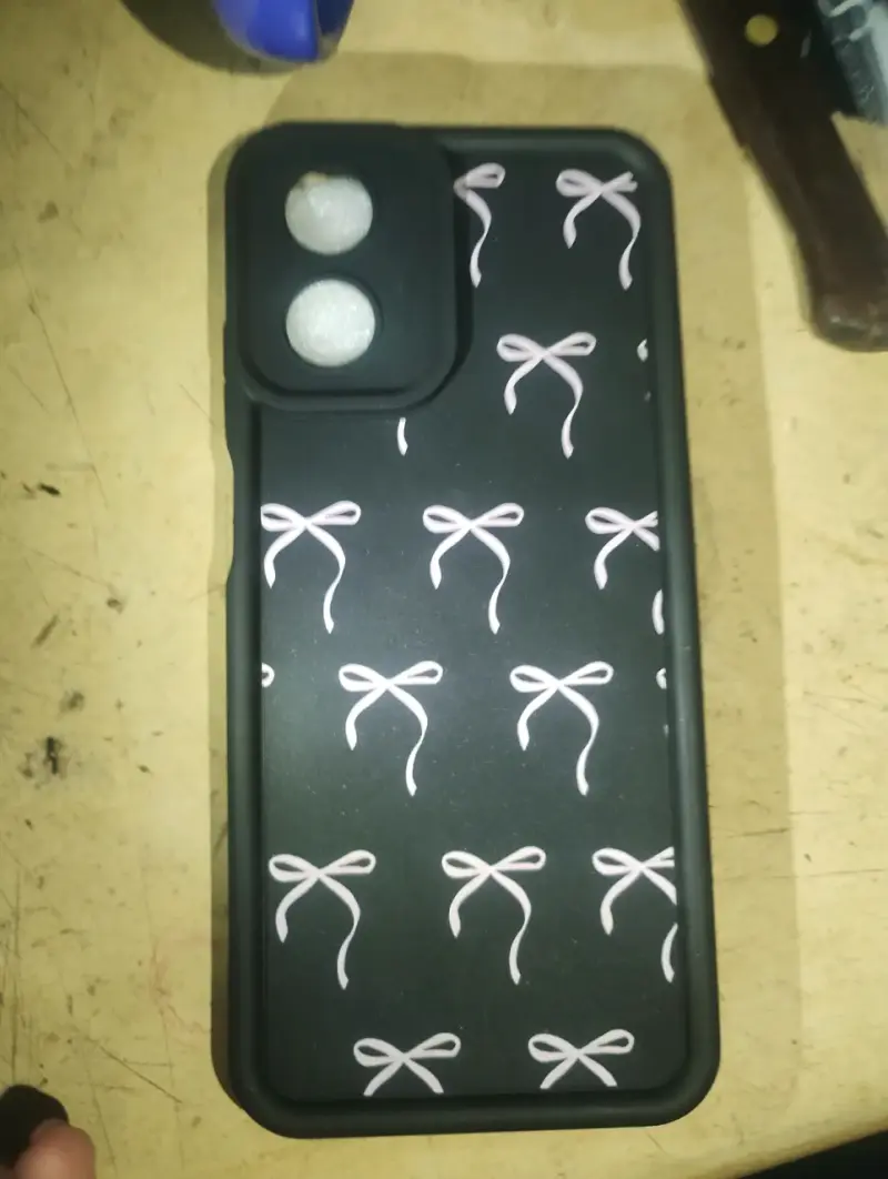 Funda negra con lazos blancos
