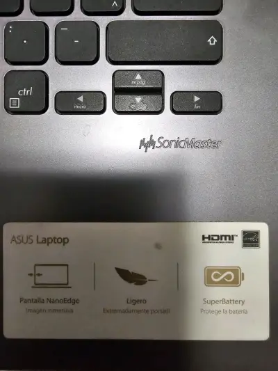Notebook ASUS con cargador - miniatura 3