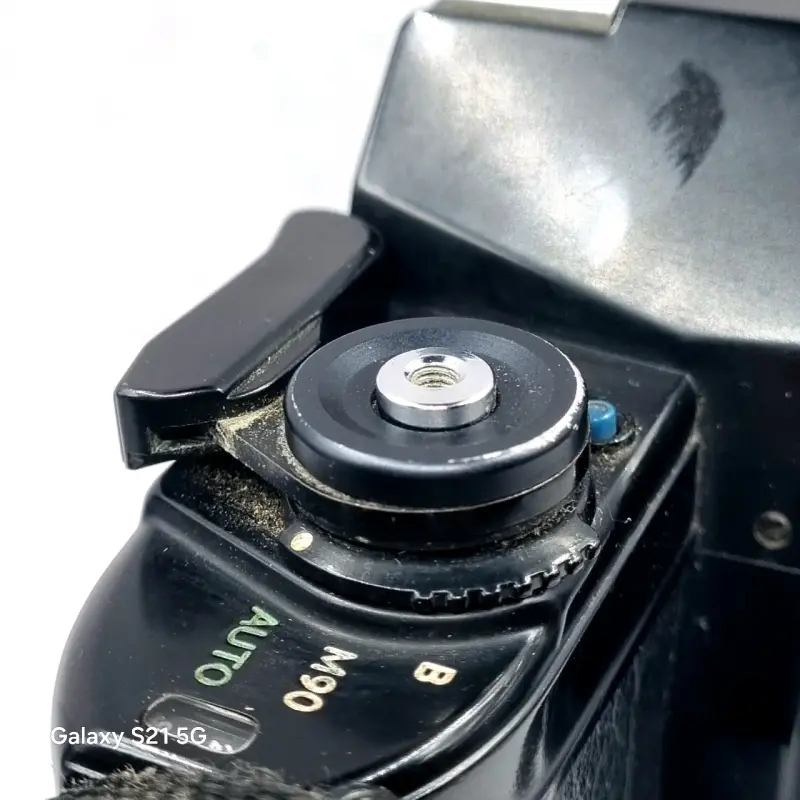 Cuerpo y motor Nikon EM manual con detalles - 2