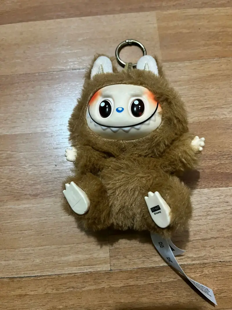 Llavero peluche monstruo marrón