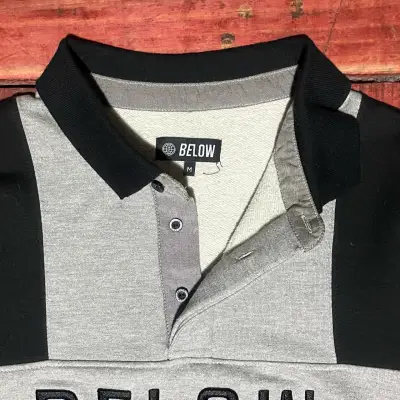 Suéter cuello polo negro y gris - miniatura 2