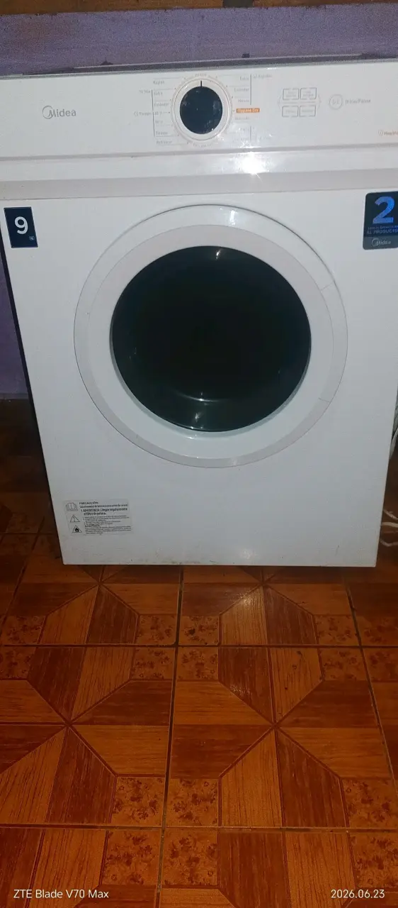 Lavadora Midea blanca frontal - 1