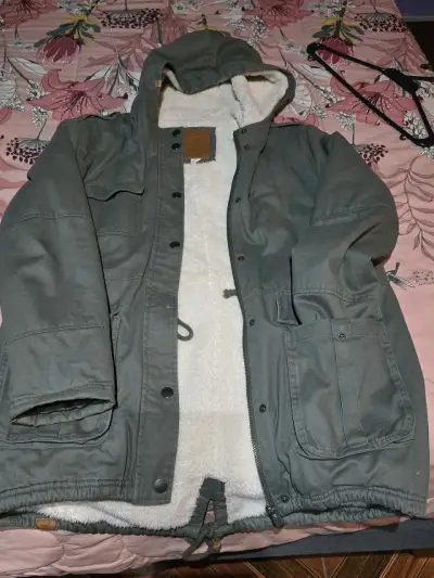 Parka verde con capucha - miniatura 1