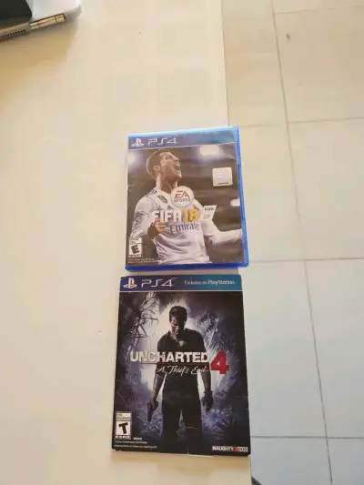 Juegos PS4 FIFA 18 y Uncharted 4 - miniatura 1