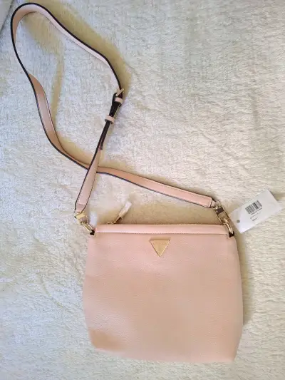 Cartera cruzada Guess rosada - miniatura 1