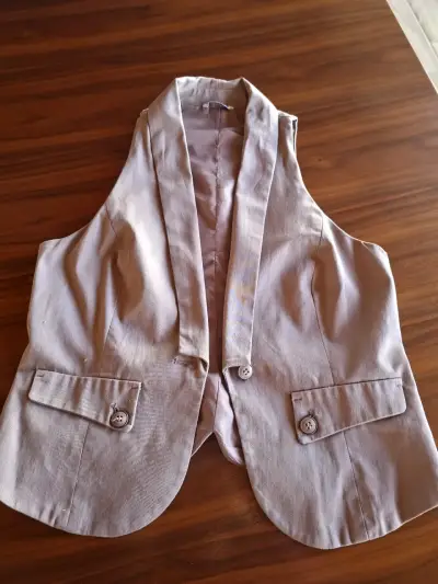 Chaleco sin mangas beige - miniatura 2