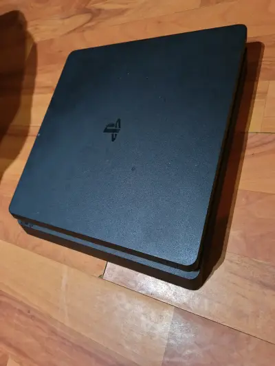 Consola PS4 Slim negra con 2 controles - miniatura 1