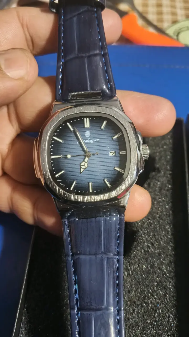 Reloj analógico plateado y azul - 1