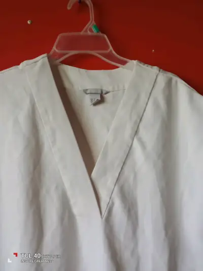 Blusa blanca sin mangas - miniatura 5