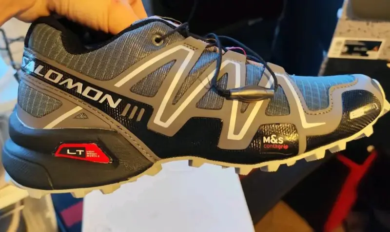 Zapatillas Salomon gris y negro - 1