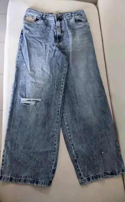 Jeans azules desgastados - miniatura 1