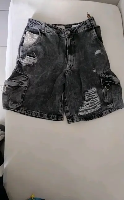 Jeans azules desgastados - miniatura 3
