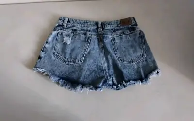 Jeans azules desgastados - miniatura 6