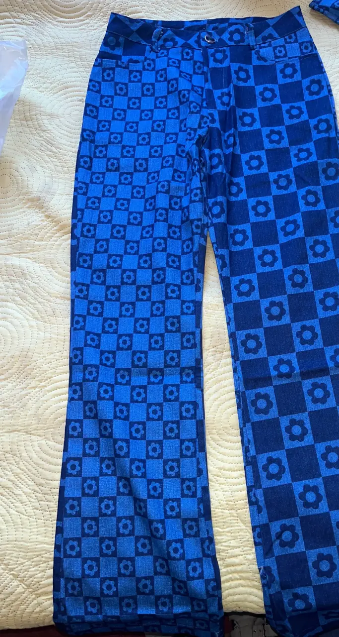 Pantalones azules con estampado floral - 1