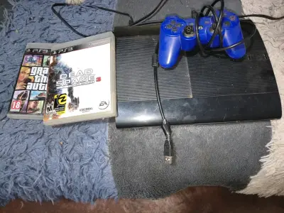 Consola PS3 con juego God of War - miniatura 3