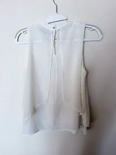 Blusa blanca basement sin mangas - miniatura 2
