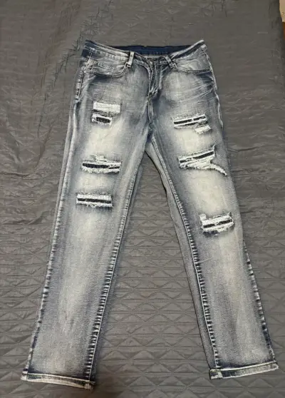 Jeans desgastados estilo drip 34 US - miniatura 1