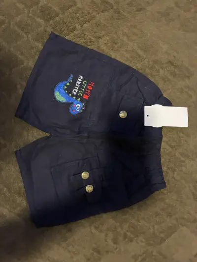 Shorts infantiles azul con dinosaurio - miniatura 1