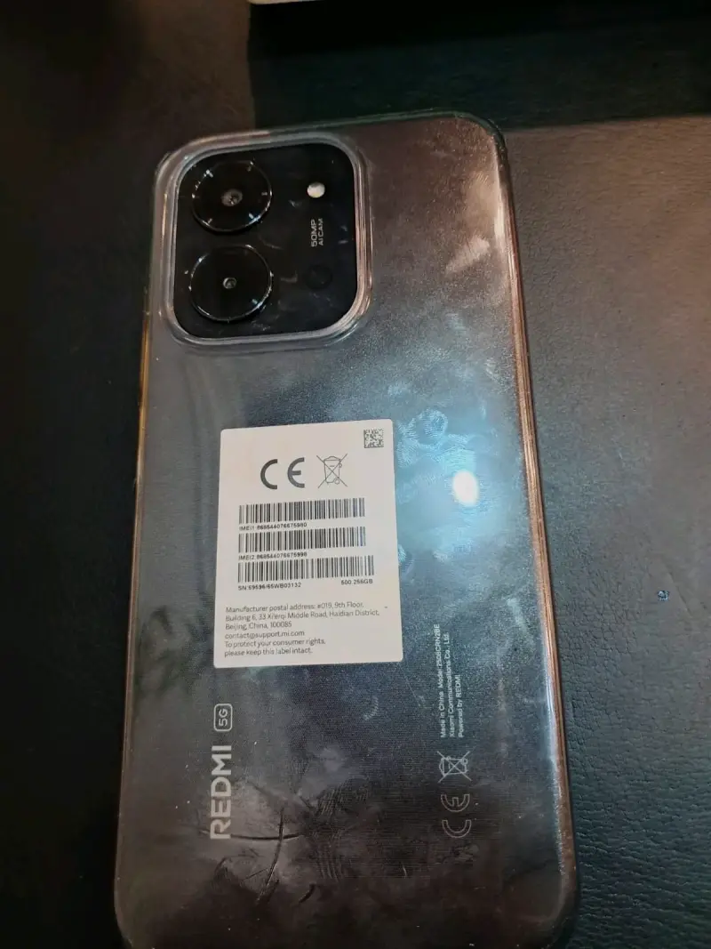 Teléfono Redmi 5G con carcasa - 1